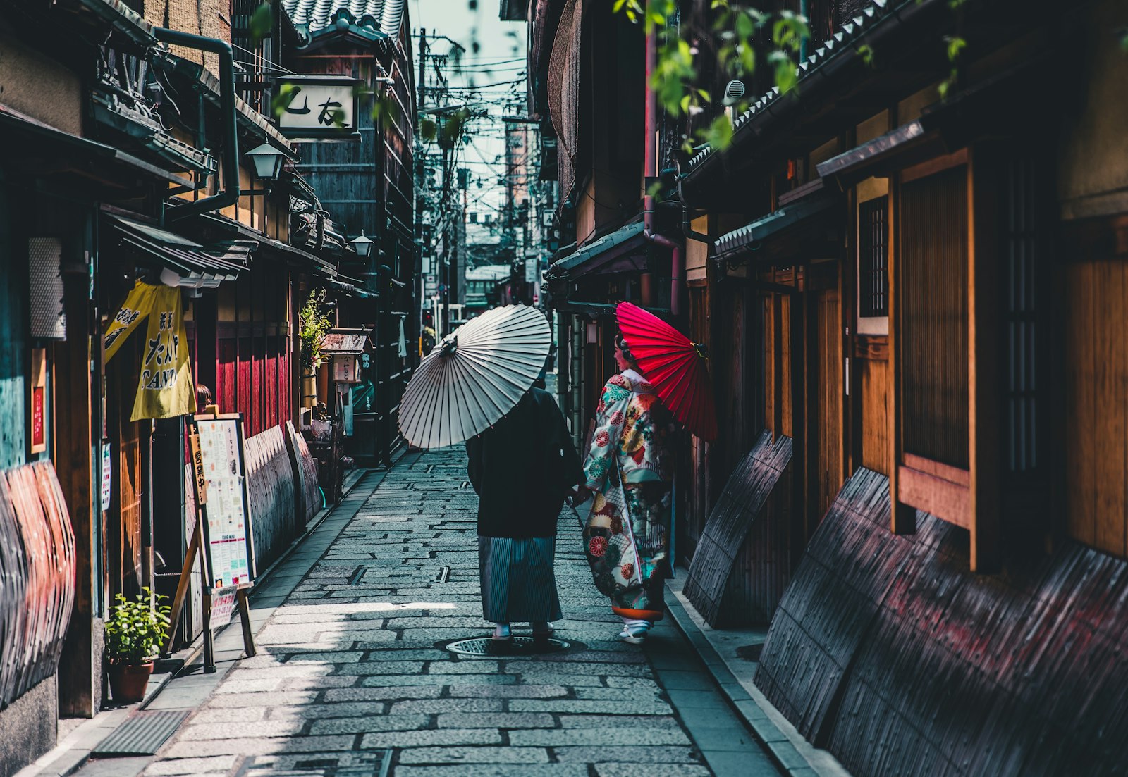A historic street in Kyoto with traditional architecture